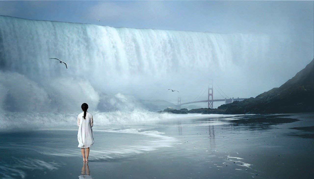 Woman at waterfall